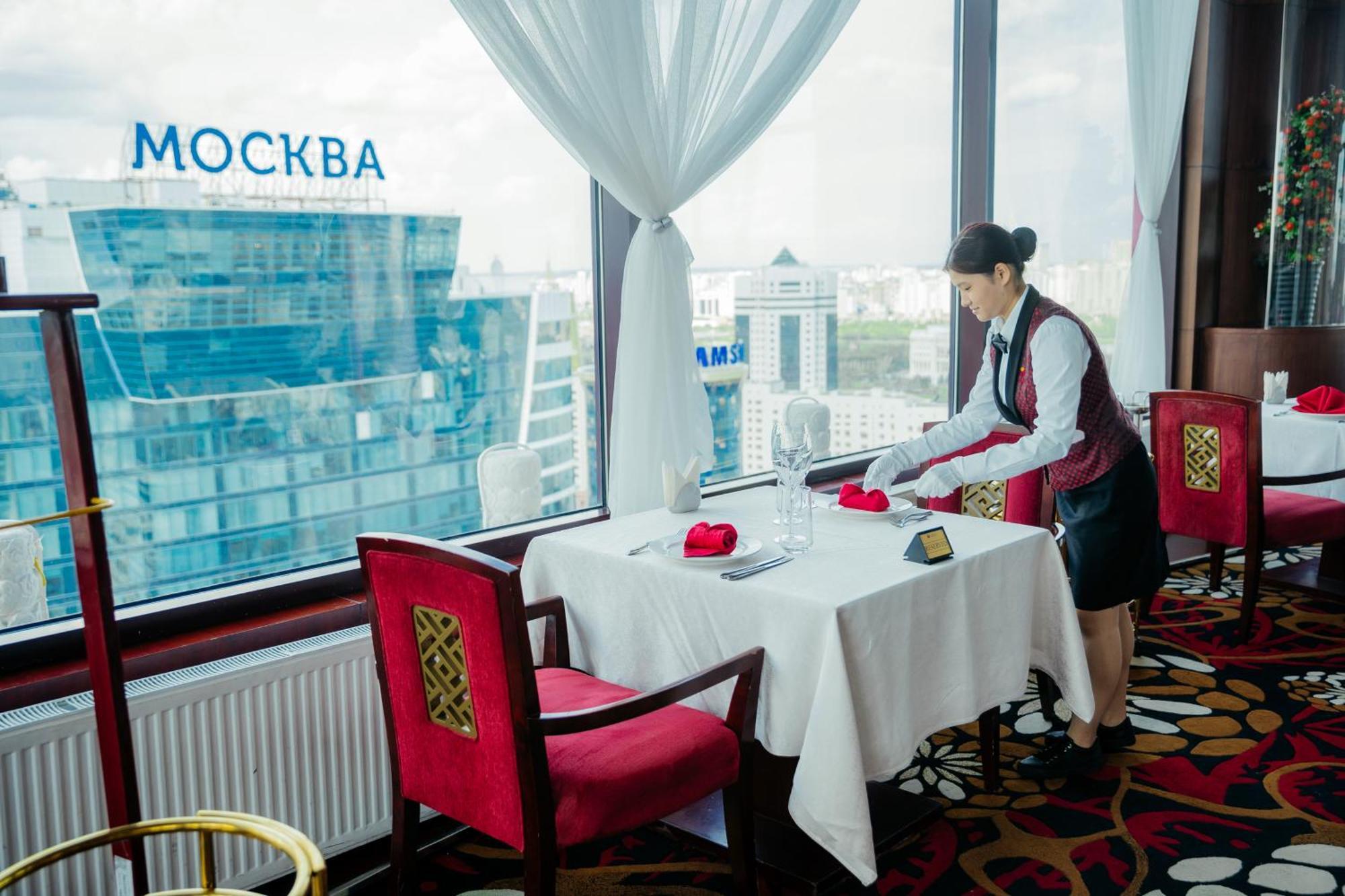 Beijing Palace Soluxe Hotel Astana Bagian luar foto A restaurant in Astana